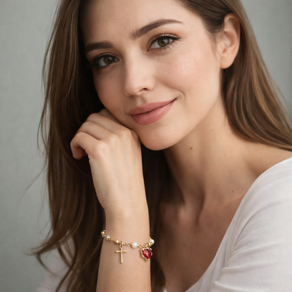Woman wearing a bracelet with a heart charm on a neutral background