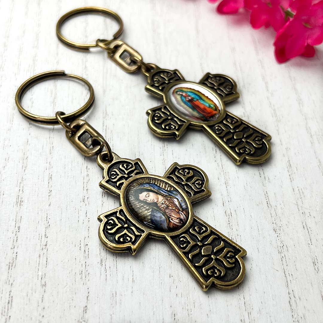 Our Lady of Guadalupe keychain is made from strong metal and engraved with beautiful flowers