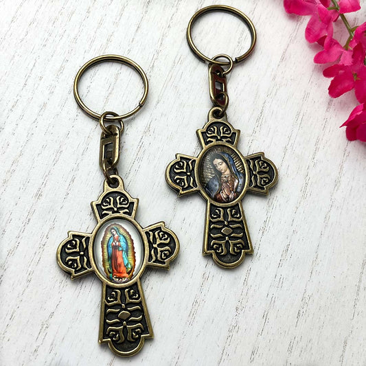Virgin Mary keychain is made from strong metal and engraved with beautiful flowers