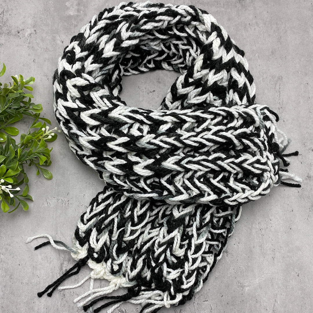 Women's black and white crochet scarf