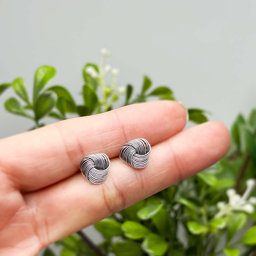 Flat knot silver earrings